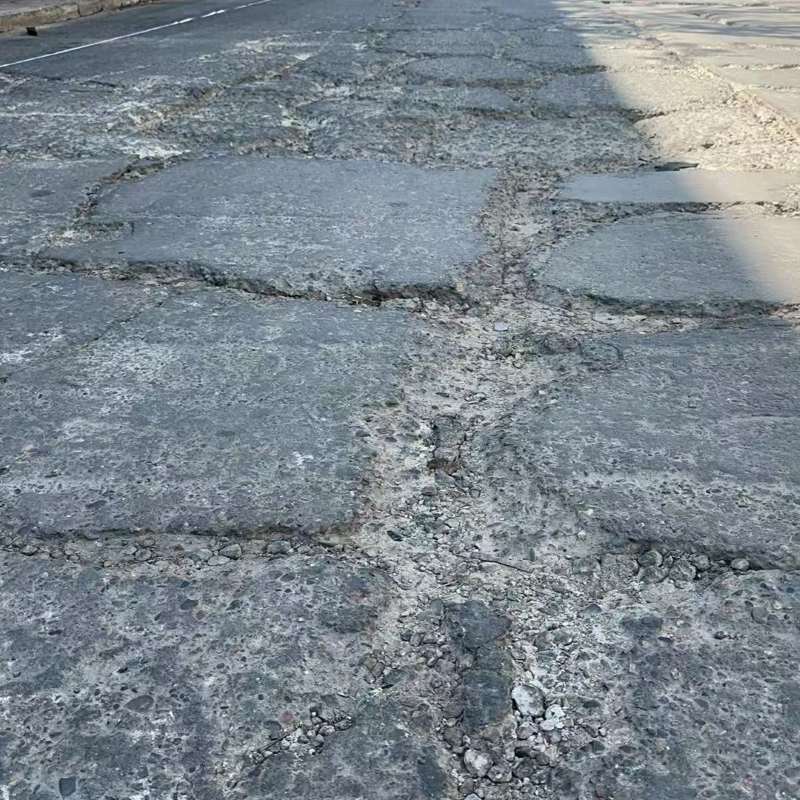 新邱路面起砂露石子修补料